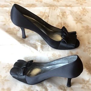 Stuart Weitzman black satin peep-toe pump.  Women’s size 6.5 US